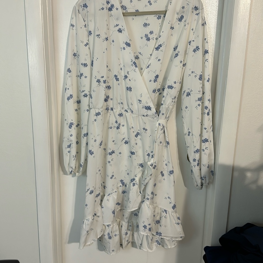 Women’s cross over knee length high-low dress.